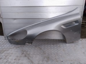 F343 LEWY BŁOTNIK ASTON MARTIN  RAPIDE 2010- 