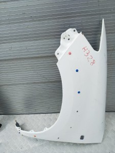 E150/F667/H328 LEWY BŁOTNIK TOYOTA HILUX 2012-16